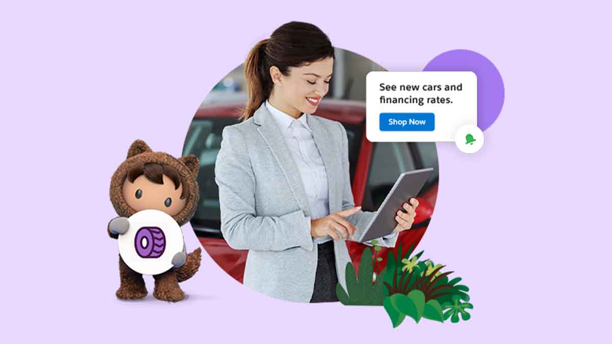 Astro with auto icon beside woman using tablet looking up financing rates